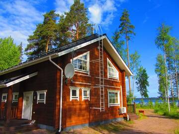 Фото номера Вилла с 4 спальнями и сауной Виллы Saimaa Lakeside г. Руоколахти 28