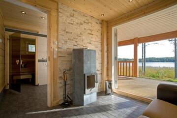 Фото номера Вилла с 4 спальнями и сауной Виллы Saimaa Lakeside г. Руоколахти 30