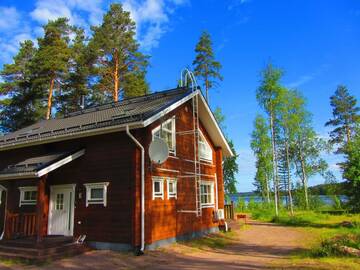 Фото номера Вилла с 4 спальнями и сауной Виллы Saimaa Lakeside г. Руоколахти 13