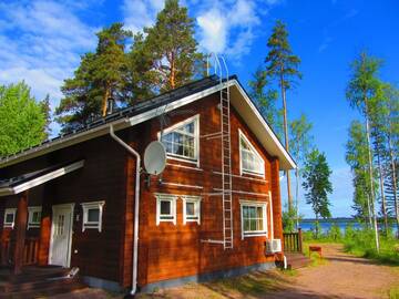 Фото номера Вилла с 4 спальнями и сауной Виллы Saimaa Lakeside г. Руоколахти 15