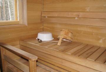 Фото номера Шале с двумя спальнями Шале Matikkala Cottages г. Руоколахти 12